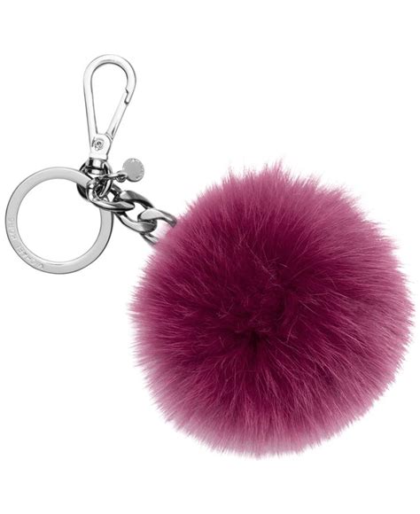 fluffy faux-fur pompom charm michael kors